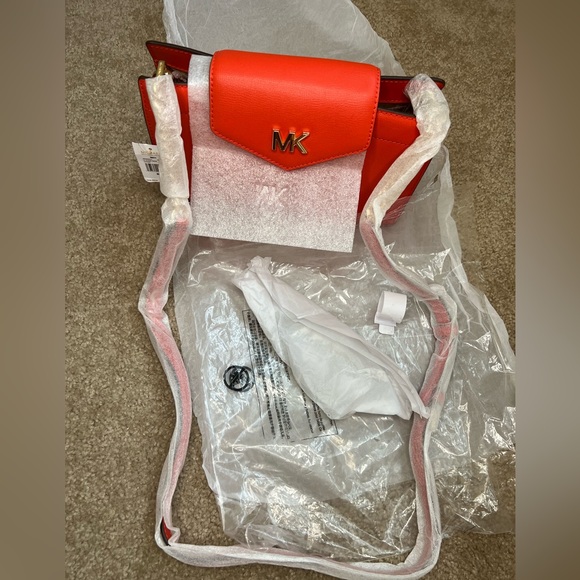 MICHAEL KORS
MOTT
35SOGOXC7L
LG CLUTCH XBODY
LEATHER
MANDARIN - Picture 10 of 11